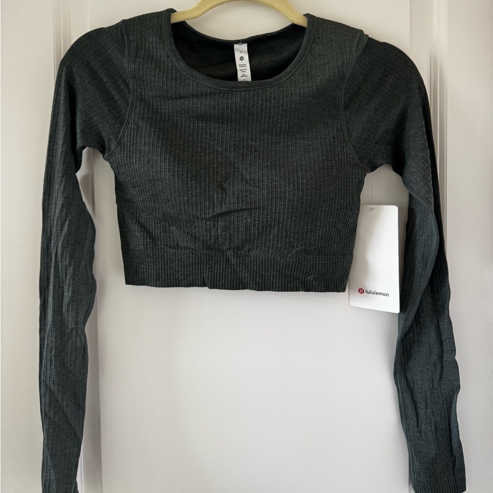 Lululemon Athletica dark green “Ebb to Street Long Sleeve” Shirt